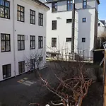 Rooms In Quiet Yellow Courtyard Apartment